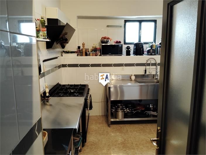 Foto df58f9c9-974e-46ee-8e85-b7fb6b0bf572. Casa a schiera con parcheggio piscina in Alcaudete