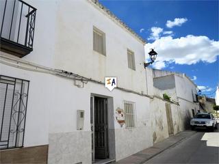 Casa adossada a Santiago de Calatrava