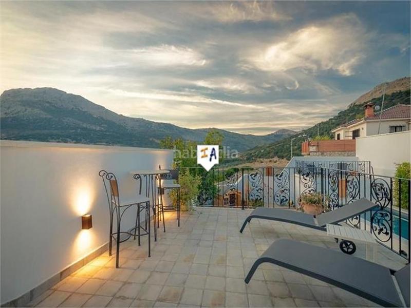 Foto ebfcf81c-b4b5-4f27-a96a-390f82da19b2. Casa adossada amb piscina a Alfarnatejo