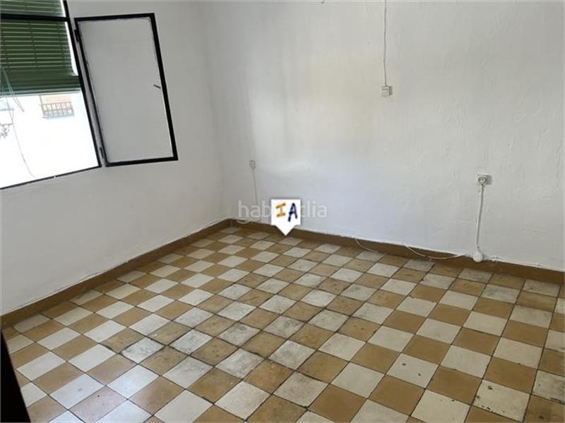 Foto dbd6f09f-3e0d-4e92-b9fa-1dbc645d8724. Casa adossada a Cabra