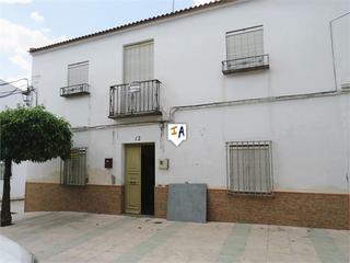 Casa adossada a Santiago de Calatrava