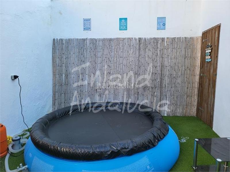 Foto cd46b29b-6873-442f-acf4-a0ed52c1b949. Casa adossada a Mollina