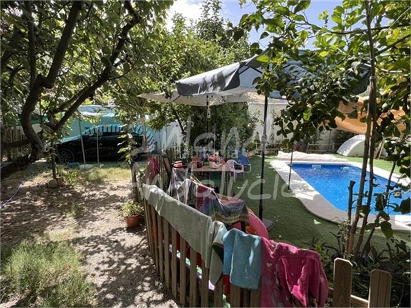 Foto 9ce71817-7ae5-403f-b93c-4a3e3c9998b7. Casa adossada amb aparcament piscina a Moclín