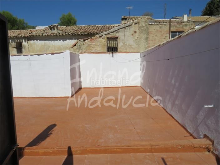 Foto 6ef175c1-4a9f-4ef6-9cb9-223310d77f70. Casa adosada en Martos