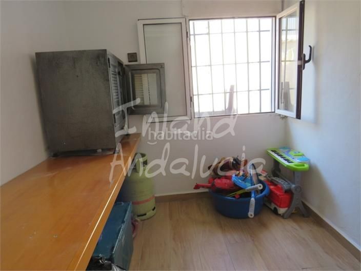 Foto ce1837e1-305f-4a18-9ca9-12fe4d51c591. Casa adosada en Martos