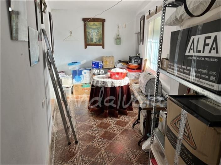 Foto e5f492ce-c50c-4136-a526-743337c9d1e4. Maison jumelée dans Moclín