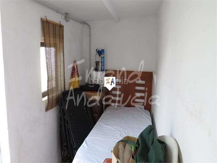 Foto 03c3a75e-f6c5-446e-a56c-815a9c122761. Casa adossada a Martos
