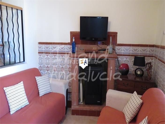 Foto 377c6968-97ba-40ae-b81f-a29c63c557e2. Casa adossada a Martos
