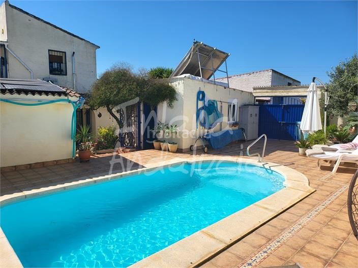 Foto f7008348-b810-47ec-a81b-a76ff72666ca. Casa adossada amb piscina a Mollina