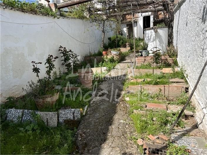 Foto 02fbcbf8-c0b9-4828-af29-04613ebebacd. Casa adossada a Baena