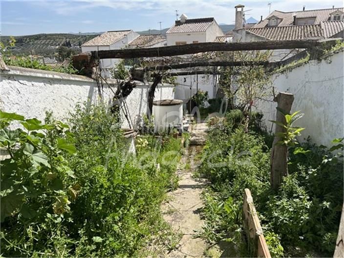 Foto 36b92274-d470-4187-af82-9b5d965dd09b. Casa adossada a Baena