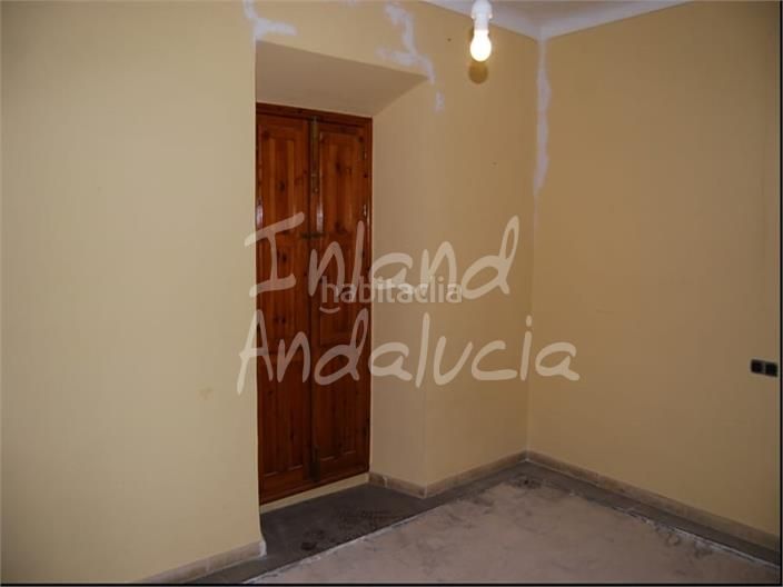 Foto 6d30754a-6836-4f5c-b7bd-befe420a2cb9. Casa adosada en Loja