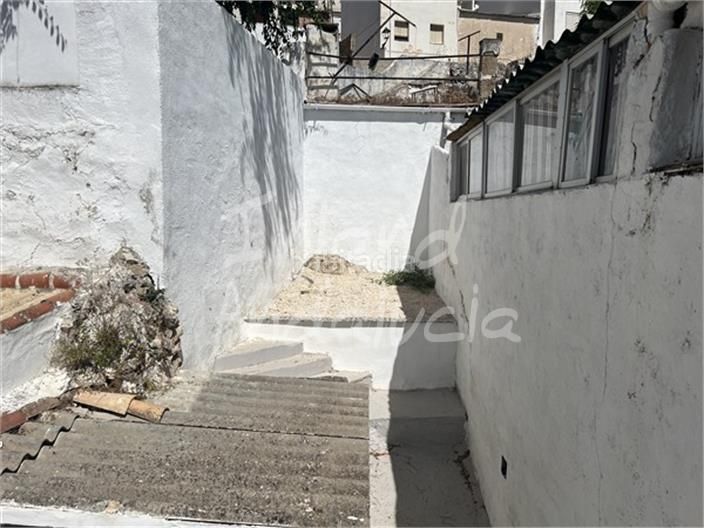 Foto c1e570bd-3504-46fc-834f-2fc7dcab9be4. Casa adosada en Luque