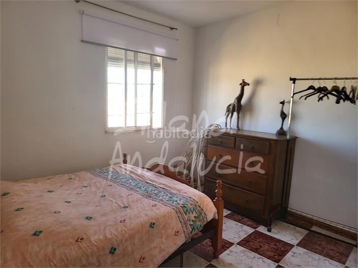 Foto c6453827-f19d-4d32-98fa-f4c3771f1a98. Casa adossada a Mollina