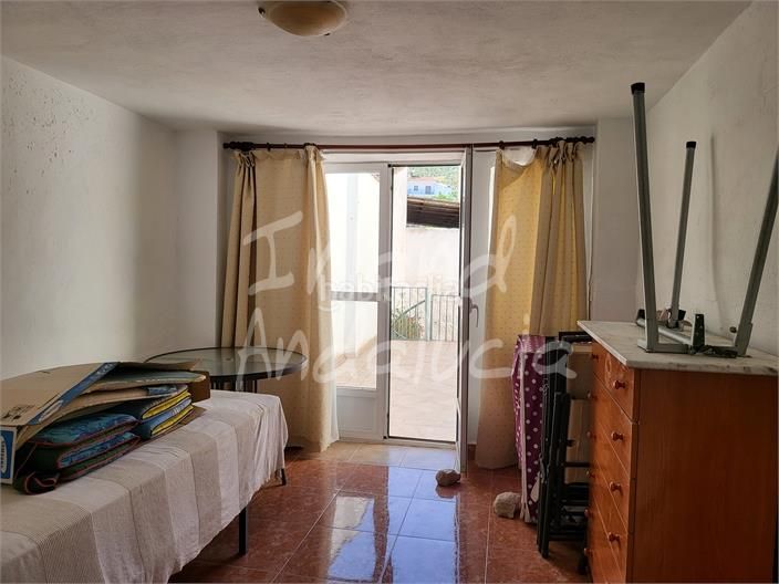 Foto 2d82611a-de49-49c5-ae0d-a805b26fa5db. Casa adossada a Cuevas de San Marcos