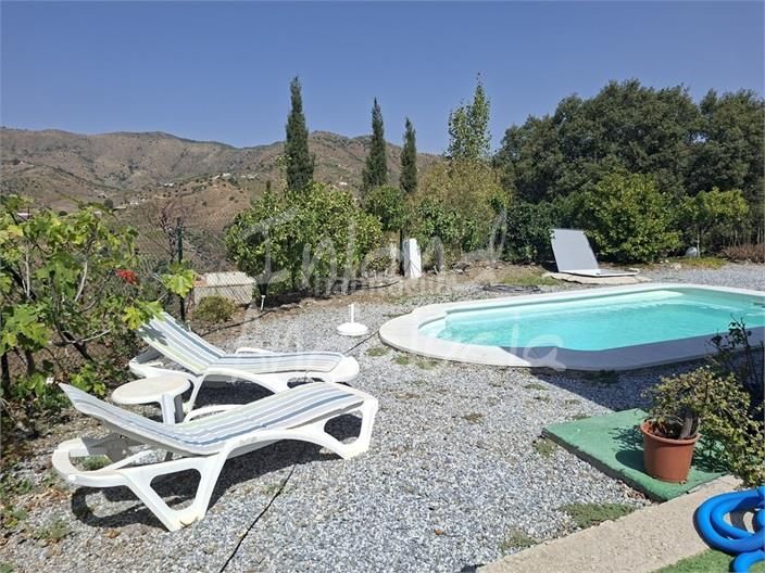 Foto 40ed513d-3621-43fb-b454-dd27aaace2ef. Masia amb piscina a Borge (El)