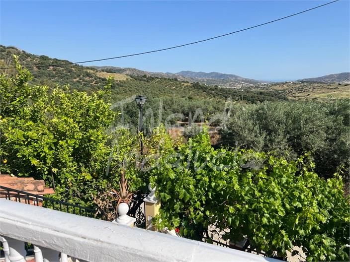 Foto a04a5fc0-d2b3-4751-a89d-21fb864a7d42. Casa adossada a Periana