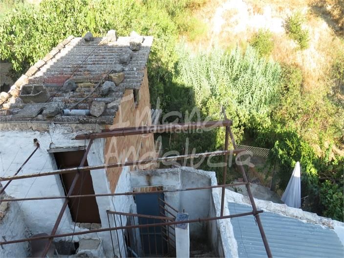 Foto e46f5c67-52bc-4a06-890d-dbd02e921a3e. Casa adossada amb aparcament a Martos