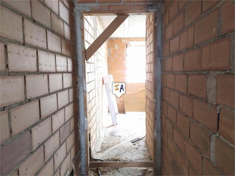 Foto fc9259cb-10a3-4e4a-866d-77eef07217ec. Casa a schiera con parcheggio in Iznájar