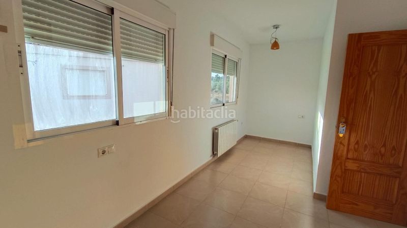 Foto 3843f044-2bb7-4a6f-8672-a3bd90358c68. Casa adossada amb aparcament piscina a La Nucia Pueblo Nucia (la)