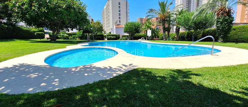 Foto 3f6e7a4e-193d-42c2-a91f-05f02f20fb0a. Casa aparellada amb aparcament piscina a Rincón Alto Benidorm