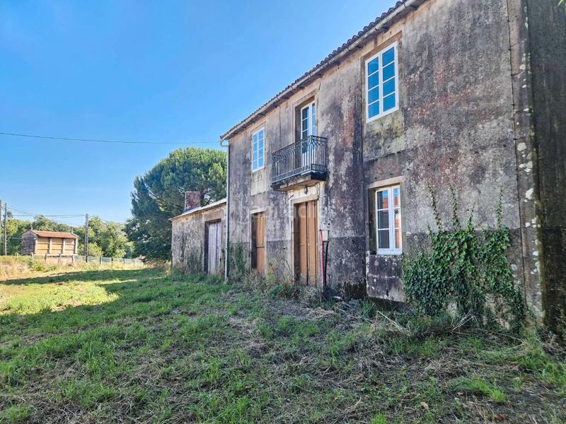 Foto 1700da02-af05-4d34-be63-5cfd1b00cb1e. Casa amb aparcament a Brión