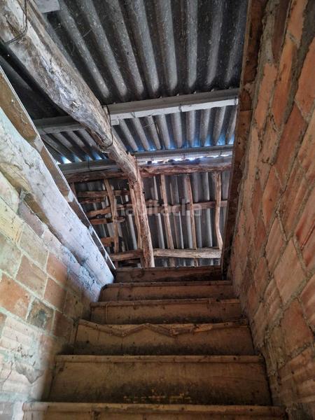 Foto c373ef27-899e-44da-851b-140f65df741c. Casa amb aparcament a Brión