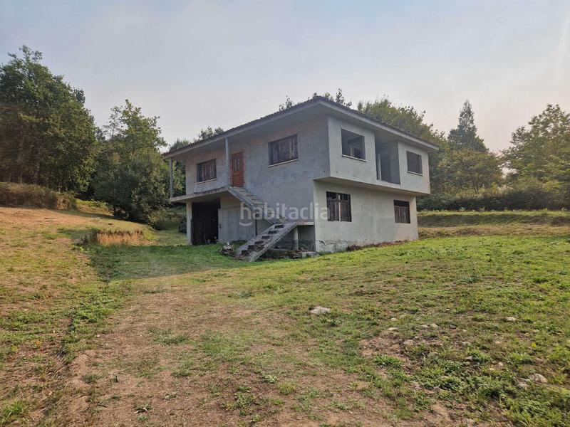 Foto 1a123a92-3913-455b-b6f2-5404565dbe98. Maison avec parking dans Teo