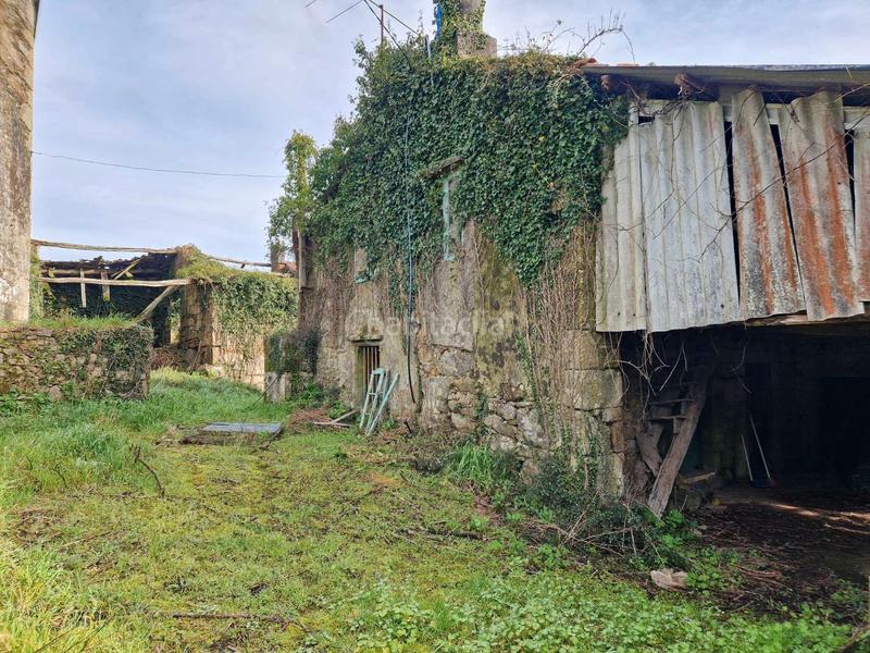 Foto e9e996c3-cbdc-4ded-ac17-fa36c18a1624. Maison avec parking dans Brión