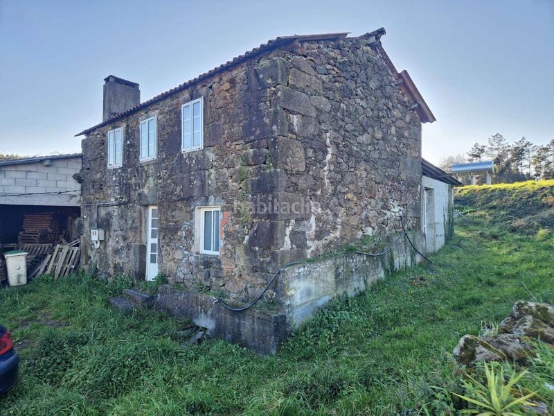 Foto e3ba51e1-3e5c-47eb-9756-40e32aa11693. Casa amb aparcament a Baña (A)