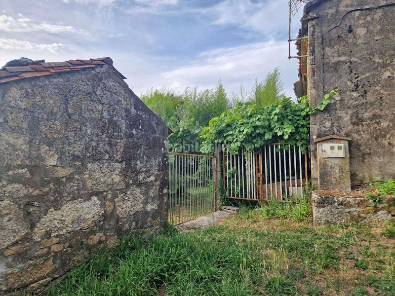 Foto 60611a8a-68c9-4061-8cbf-ded5aefb1290. Casa adossada amb aparcament a Teo