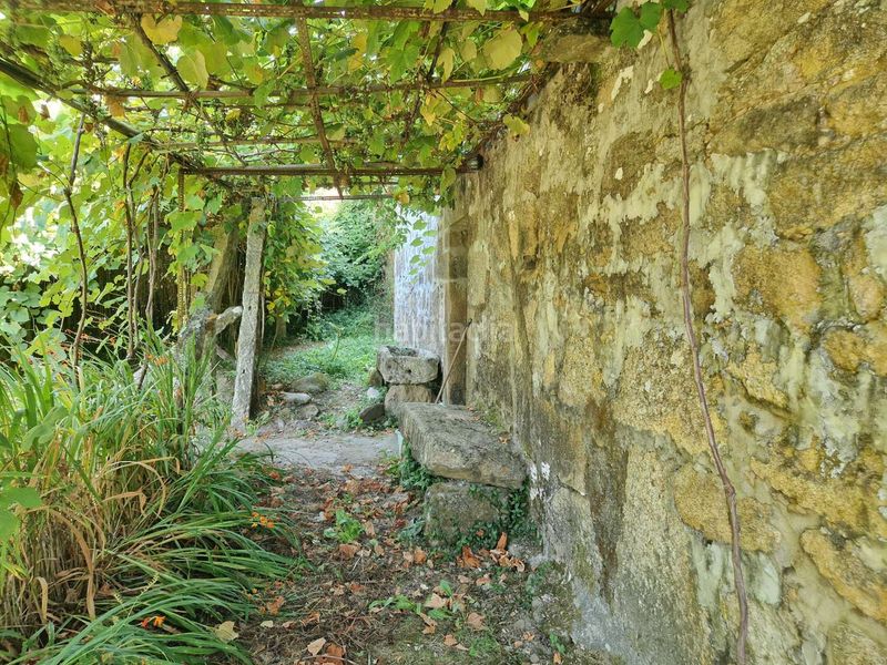 Foto 8096bd14-fa65-43b2-9d4a-5108fc1d44b1. Casa adossada amb aparcament a Teo