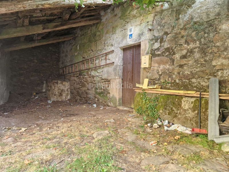Foto 8caeece5-9882-4336-9c42-ced5a25b4079. Casa adossada amb aparcament a Teo