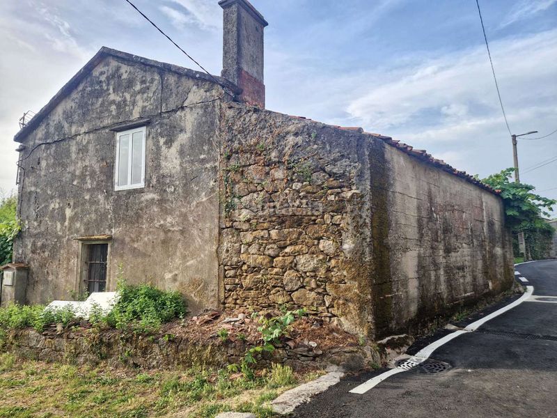 Foto c713756c-7ff9-470c-ad6c-36968f3bd53d. Casa adossada amb aparcament a Teo