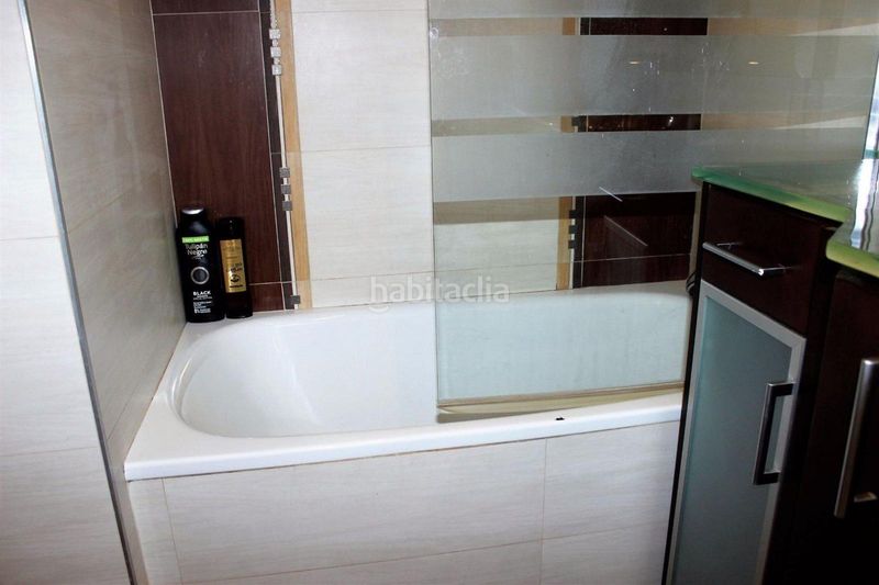 Foto cb3b1b93-0bbe-4e04-ad7d-2a60a19e91ad. Casa adossada amb calefacció aparcament piscina a Torredembarra