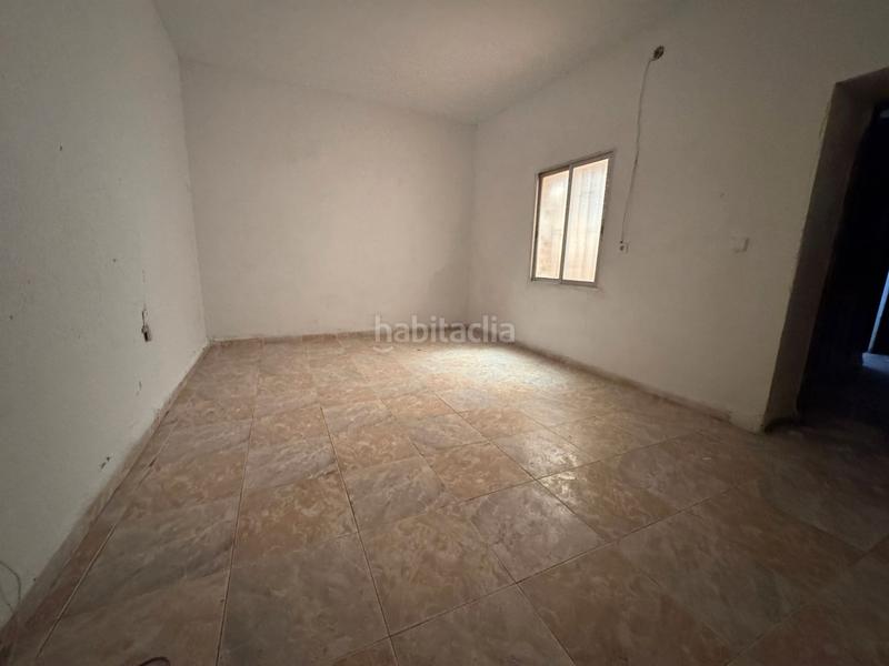 Foto a69f42c5-11f5-4a5a-95e8-ff89ca3b2b22. Casa aparellada amb aparcament a Arrayanes Linares