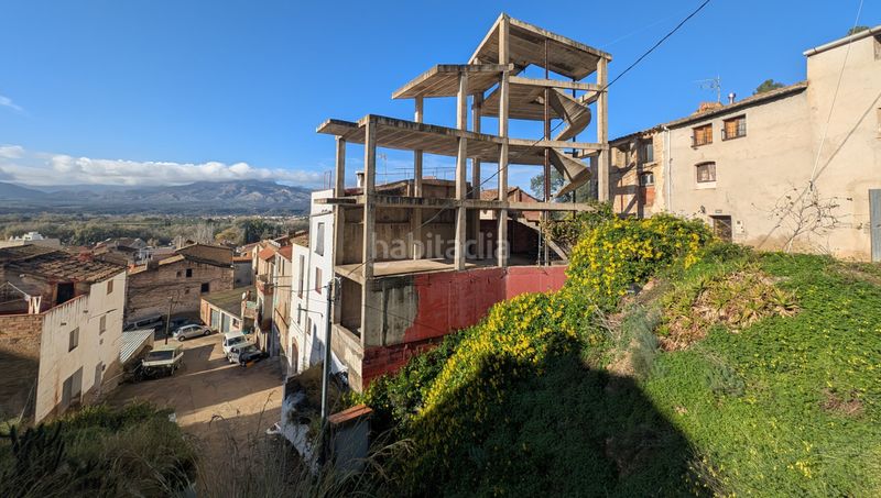 Foto 9efefe10-91a2-4a3b-bf1f-448b553a43fe. Edificio en Tivenys