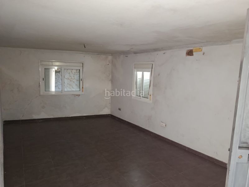 Foto 2580fef6-13be-4ddc-b268-3df2319cfc1e. Casa a Lora del Río