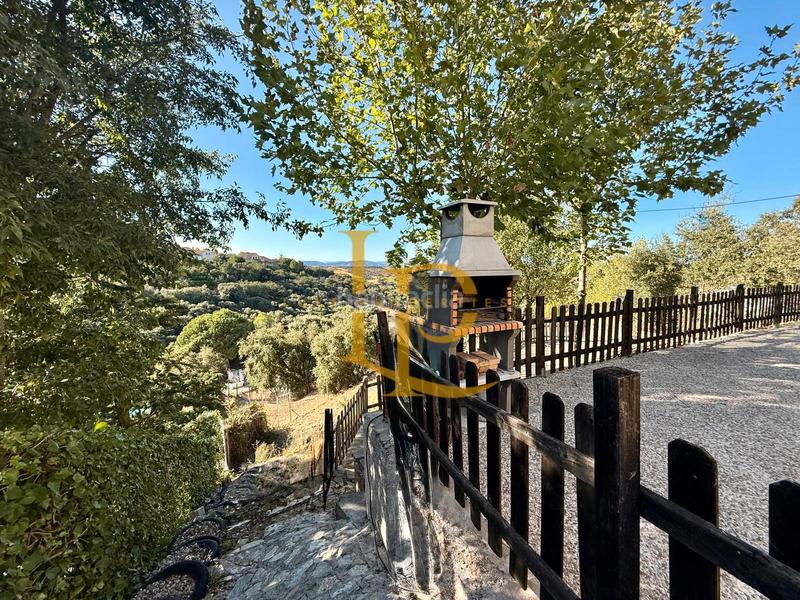 Foto 041ba57b-2e22-4bb5-bb45-b95265892ee4. Chalet mit kamin heizung parking in Casar (El)