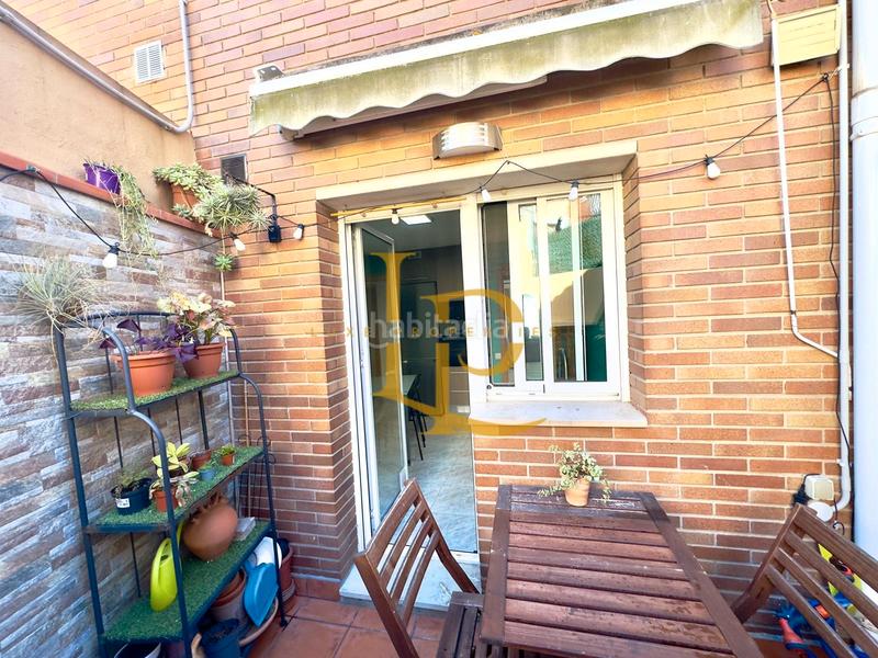 Foto 0f11bc7a-99c4-4879-9619-e9a0fcc0ef96. Semi detached house with fireplace heating parking in Rubí