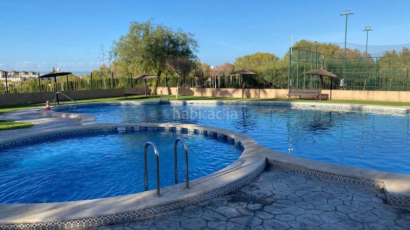 Foto d7ada0ff-c1d4-4fee-81a9-cde7cfa416b4. Casa bifamiliare con riscaldamento piscina in La Florida Orihuela