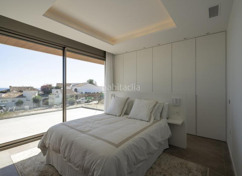 Foto 7ba9fc14-b8b1-4000-97ce-9bb3c7610740. Xalet amb aparcament piscina a El Faro de Calaburra - Chaparral Mijas