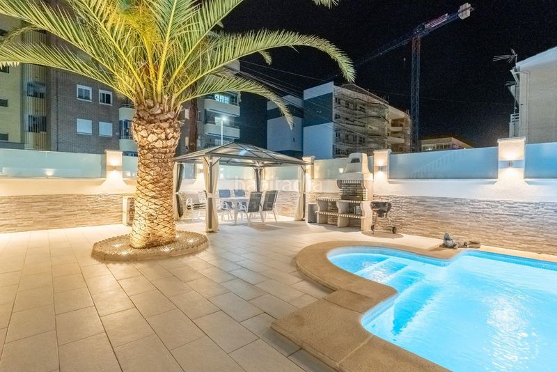 Foto 1a8810ce-4d98-4371-a42a-83a37added2a. Casa adossada amb calefacció aparcament piscina a Torrevieja