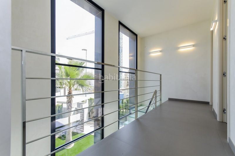 Foto 8de6839b-da7f-4c80-ab5a-cb936e722fb8. Xalet amb aparcament piscina a Campoamor Orihuela