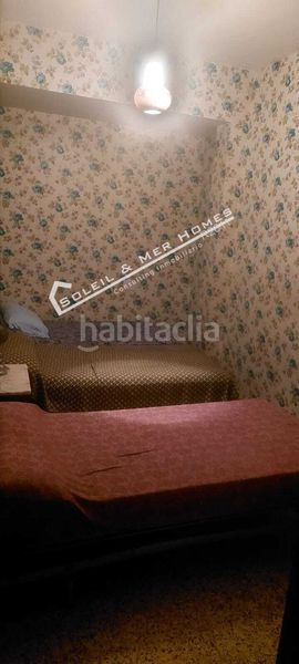 Foto 68801129-0210-4d39-8988-b501ac55e518. Casa adossada a El Perelló Sueca