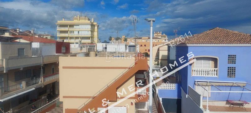 Foto ab3eb2a5-df57-443b-9362-cb0897bab984. Casa adossada a El Perelló Sueca