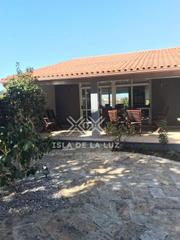 Chalet  Calle rua condesa 2 531. Chalet en la isla de la toja, con piscina y jardín privado