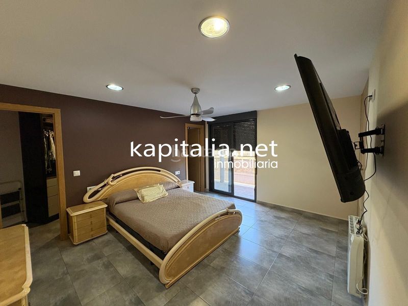 Foto 8c59a1d2-ef57-4d8c-bd23-ea40b8428f65. Reihenhaus mit parking pool in Alcúdia de Crespins (l´)