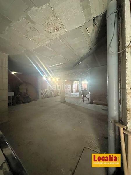 Foto 1a374a41-5d12-4ba5-8211-9992e5dc18bc. Alquiler local comercial localia inmobiliaria te ofrece un local diáfano en bruto, ubicado en los bajos de un edificio residencial en el centro de santiago en Cartes