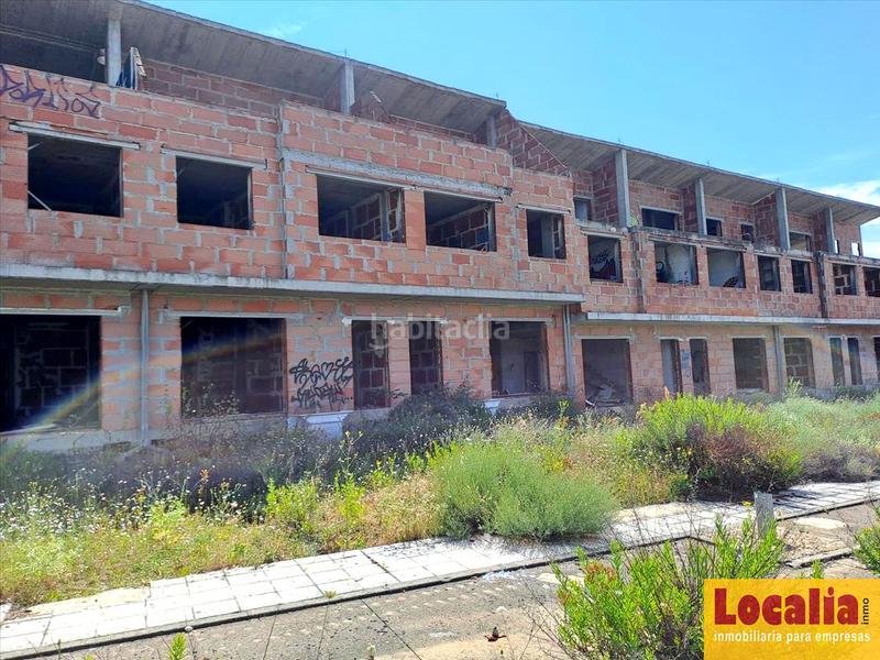 Foto 4f2ac029-04ea-4c27-a6f2-cbe9b623ef88. Terreno residencial en general obra parada de 73 viviendas , león en Valdefresno